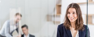 Cheerful business woman in office