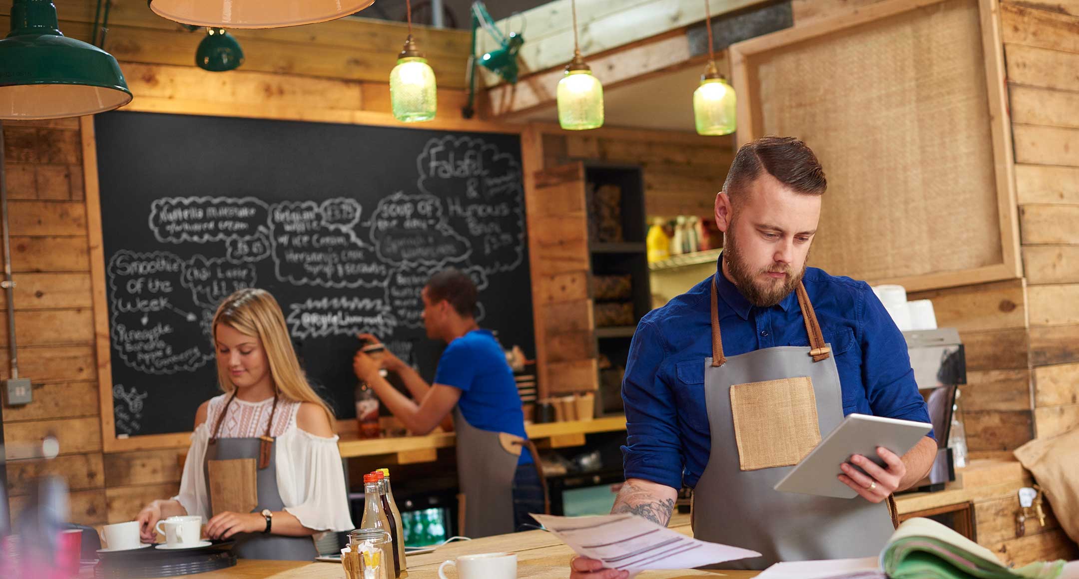 Small business owner using an iPad